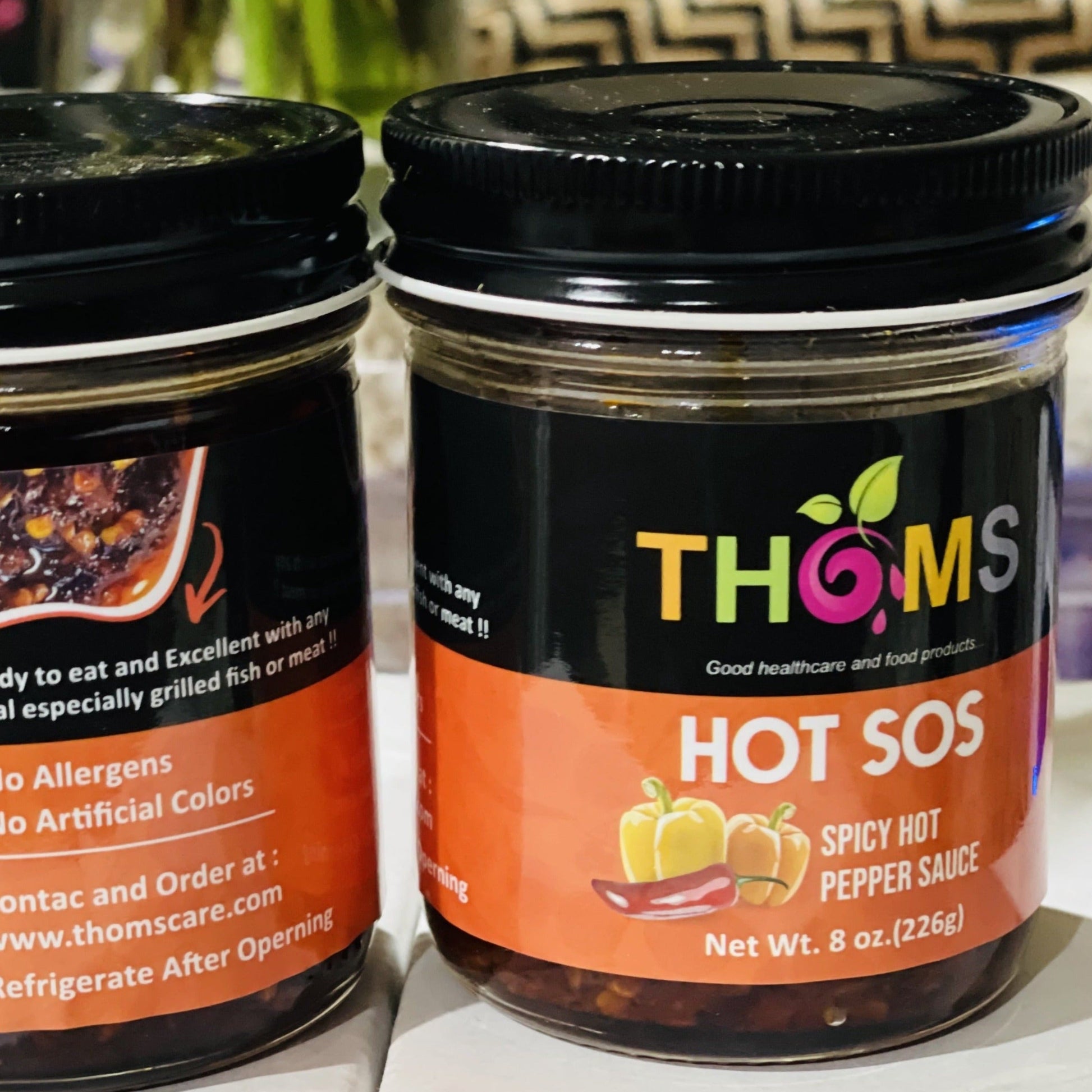 THOMS spicy hot sauce for all your meals and meats!