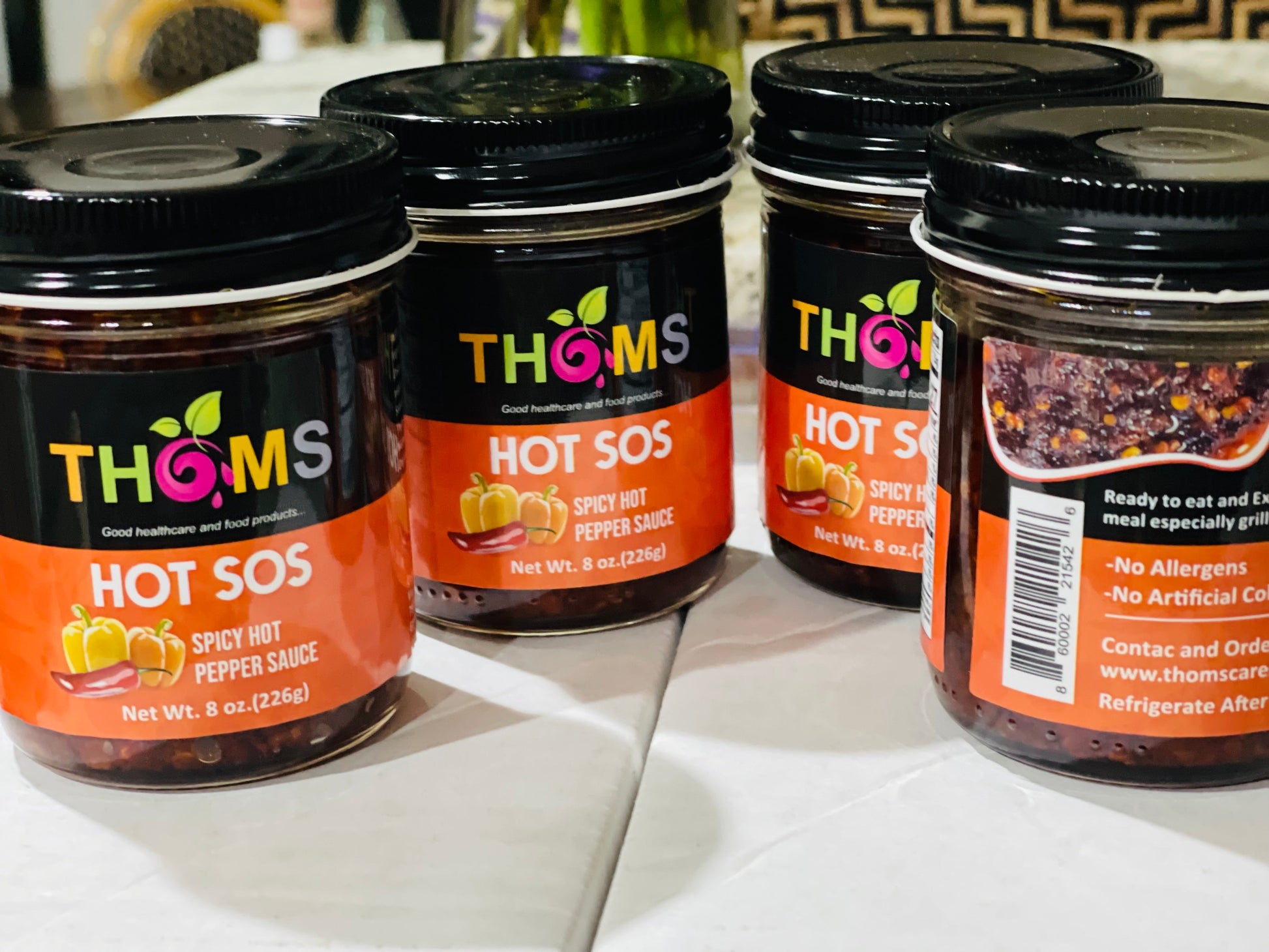 THOMS spicy hot sauce for all your meals and meats!